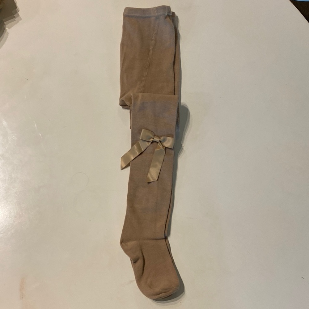 Girls cotton tights Size 8 run small (5-7) bow on both sides brand new tan
